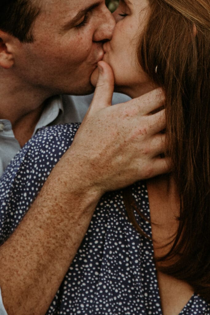 Close up couples portrait, kissing at session by Georgia photographer, Kattie Jackson.