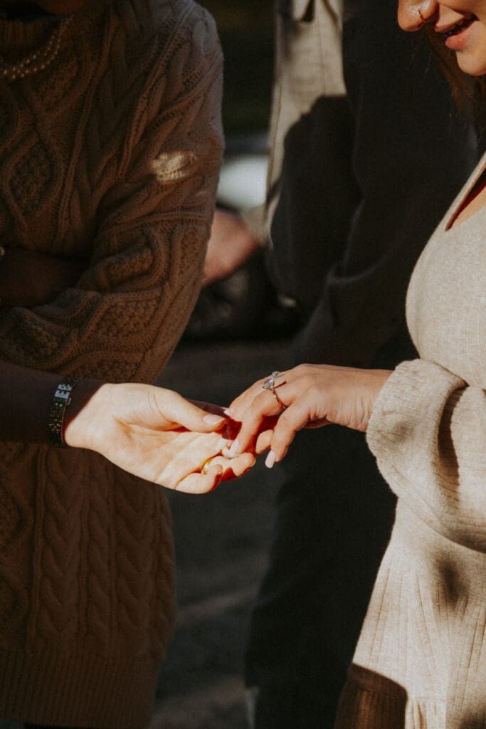documentary styled moment of family admiring new ring after proposal. by Atlanta wedding photographer kattie jackson 